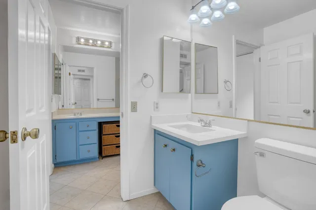 a bathroom with a shower and a toilet