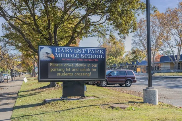 a view of a building with a tree
