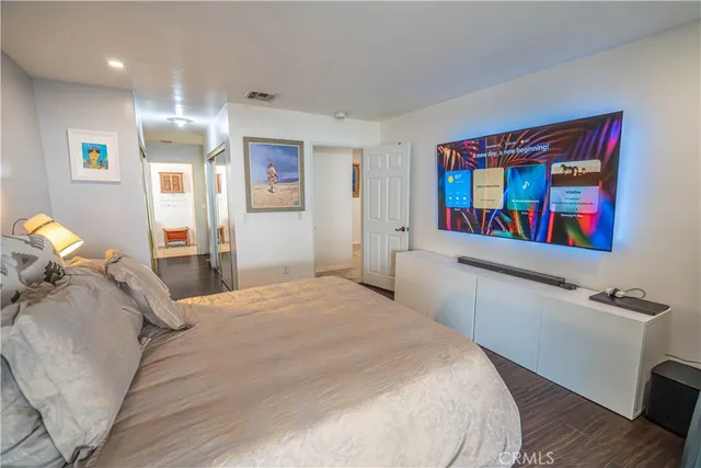 a bedroom with a bed and furniture