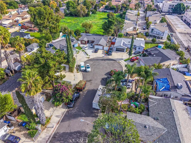 an aerial view of a house with a garden