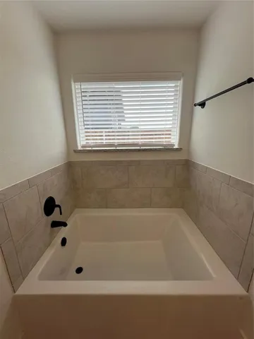a bathroom with a bathtub