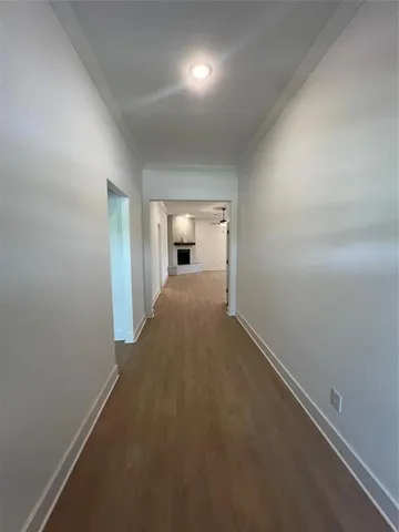 a view of a room with a hallway