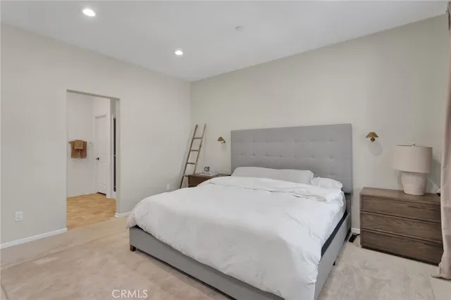 a bedroom with a bed and a closet