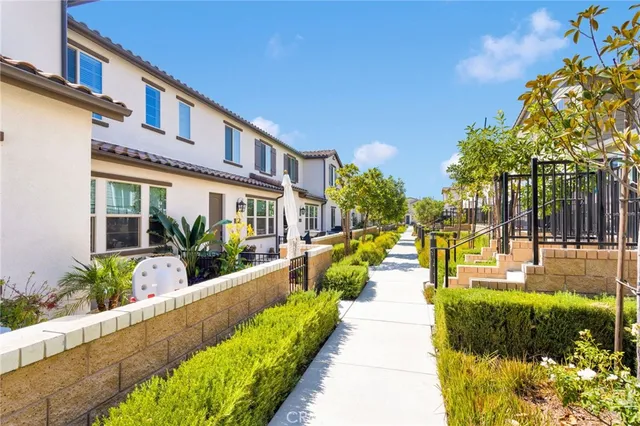 a view of a swimming pool with an outdoor seating