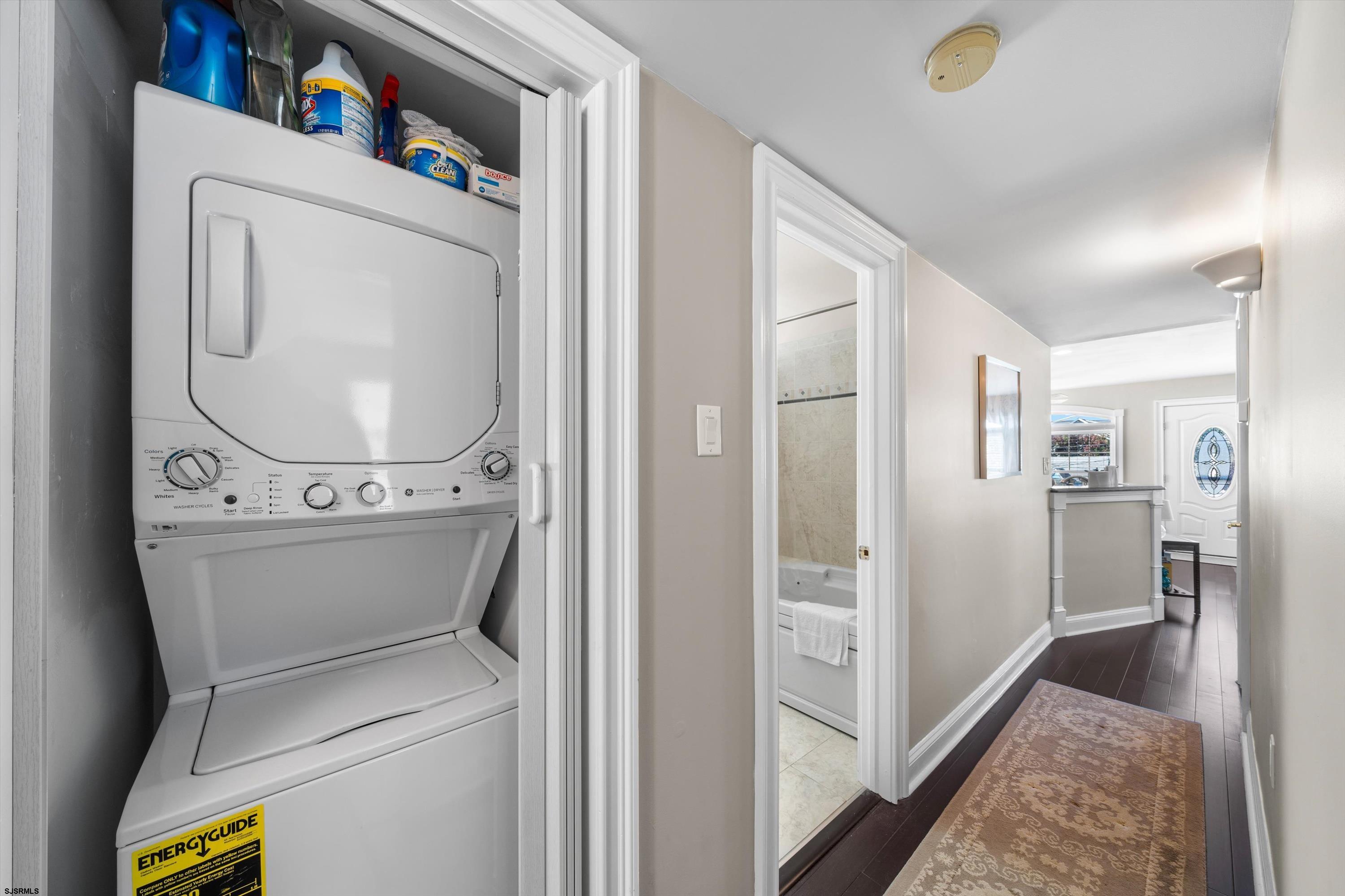 51 Simpson Road, Unit 2 Ocean City, NJ 08226 - Photo 29 of 43 a view of a hallway with washer and dryer