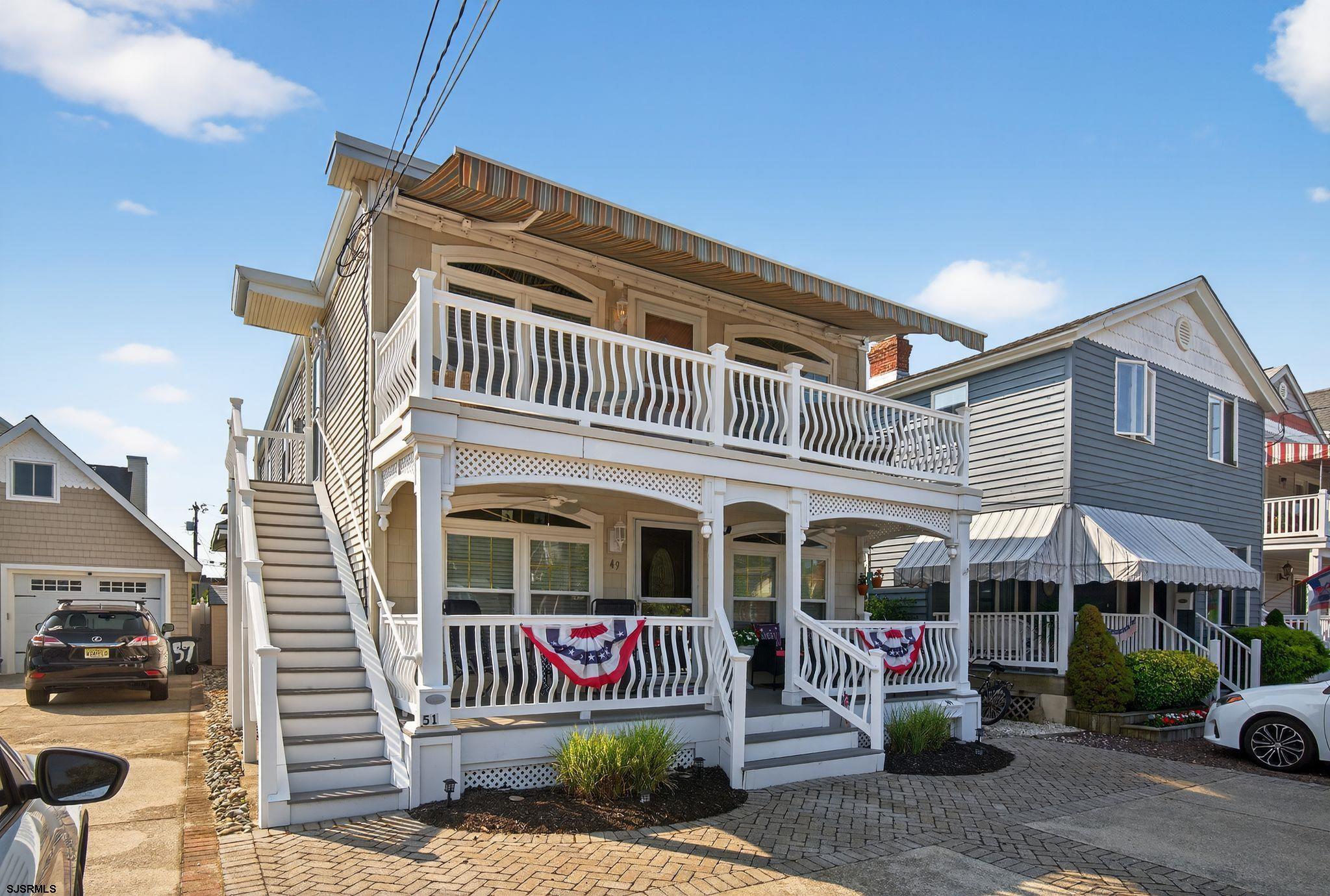 51 Simpson Road, Unit 2 Ocean City, NJ 08226 - Photo 3 of 43 a front view of a house with a garden