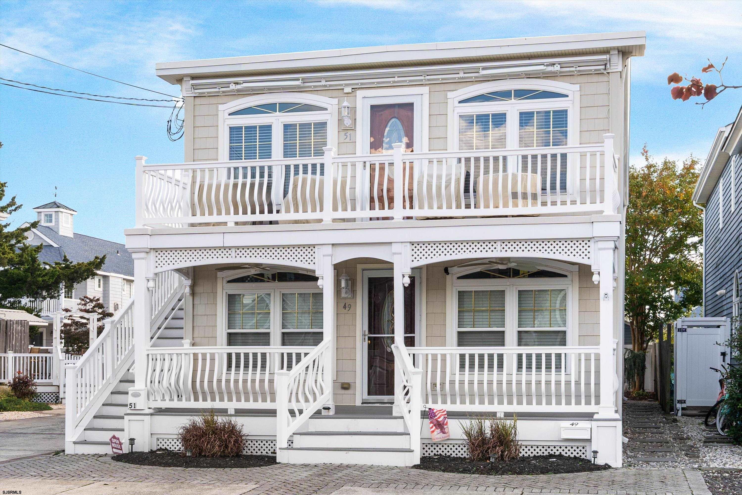 51 Simpson Road, Unit 2 Ocean City, NJ 08226 - Photo 36 of 43 a front view of a house with a porch
