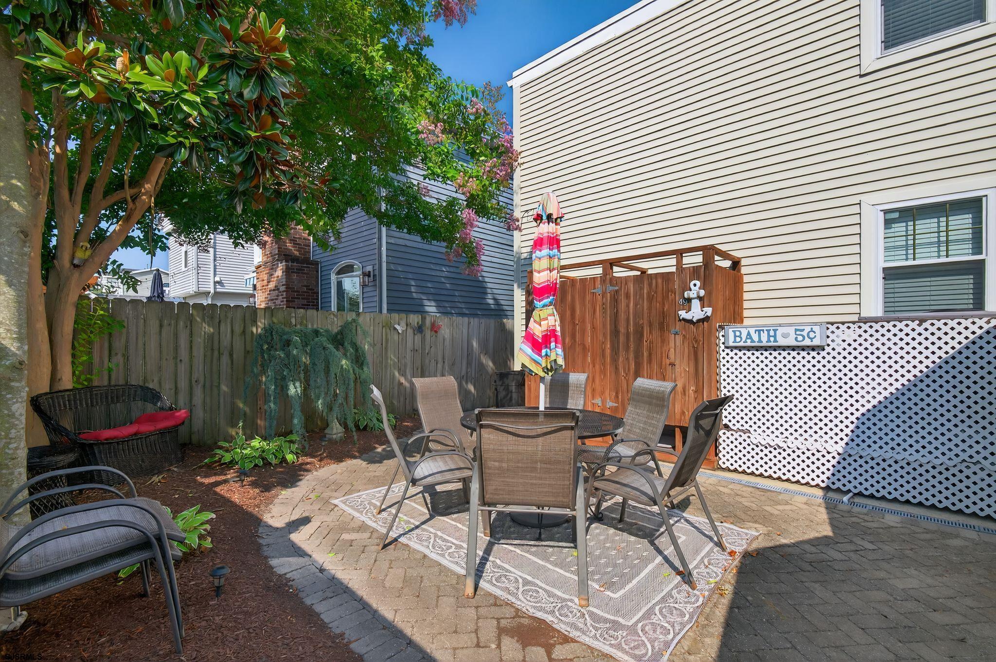 51 Simpson Road, Unit 2 Ocean City, NJ 08226 - Photo 7 of 43 a view of a chairs and table in patio