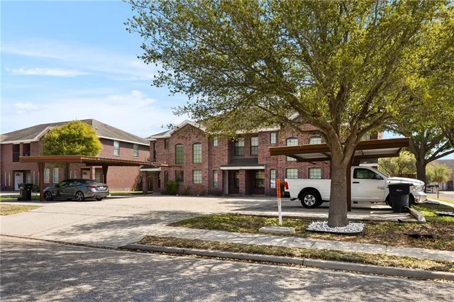 a view of street with parked cars