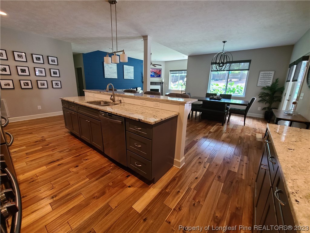 215 Devon Circle Aberdeen, NC 28315 - Photo 14 of 35 a living room with hard wood flooring and a couch