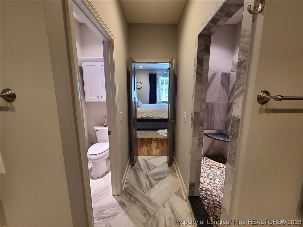215 Devon Circle Aberdeen, NC 28315 - Photo 19 of 35 a bathroom with a sink and a toilet