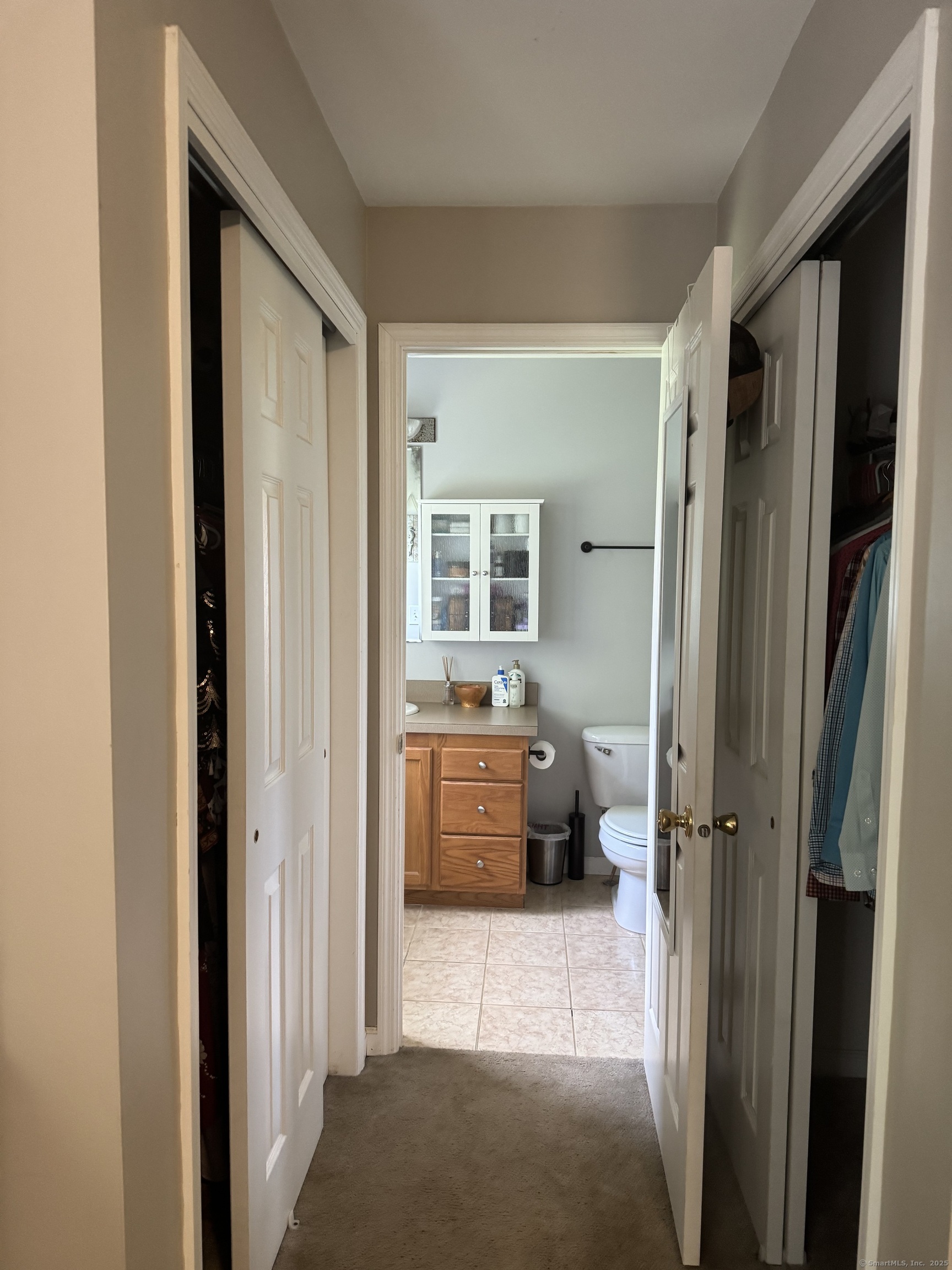11 Carpenter Street Norwich, CT 06360 - Photo 9 of 12 a bathroom with a tub shower and a sink