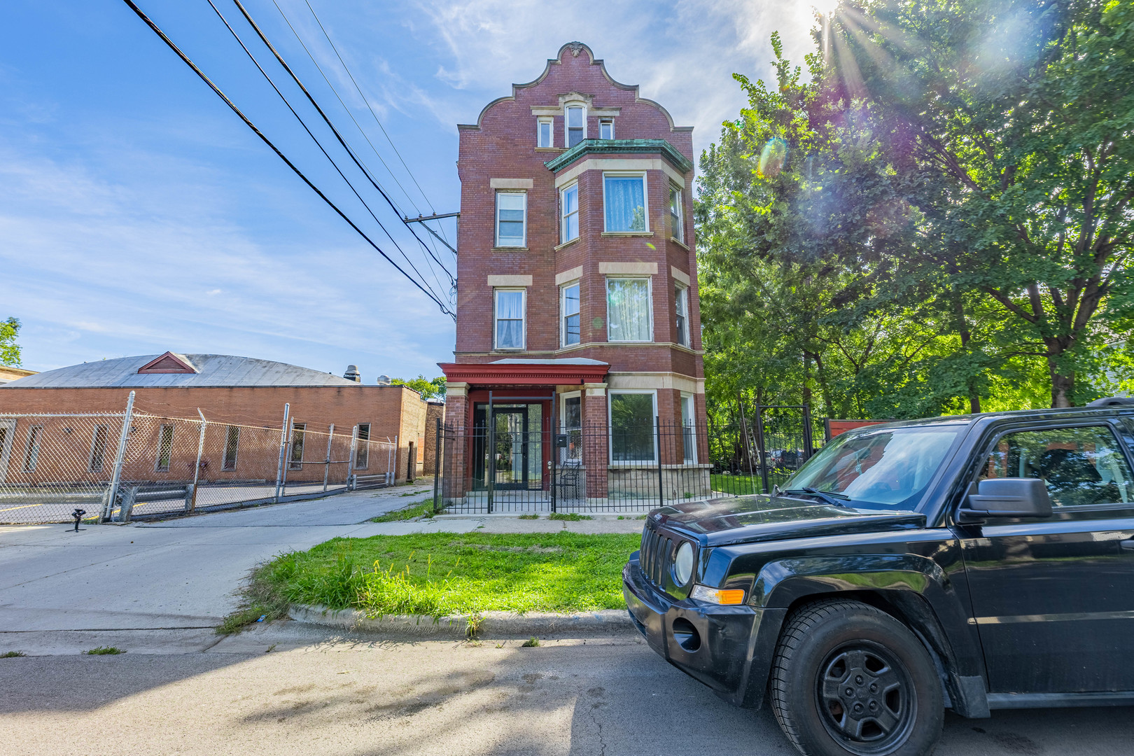 a car parked in front of a house