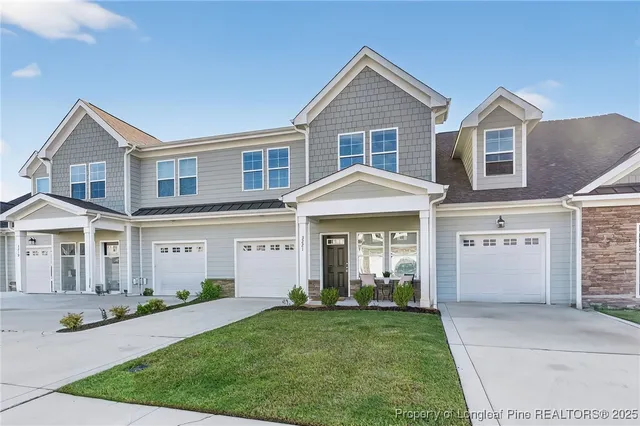 a view of a workspace with furniture