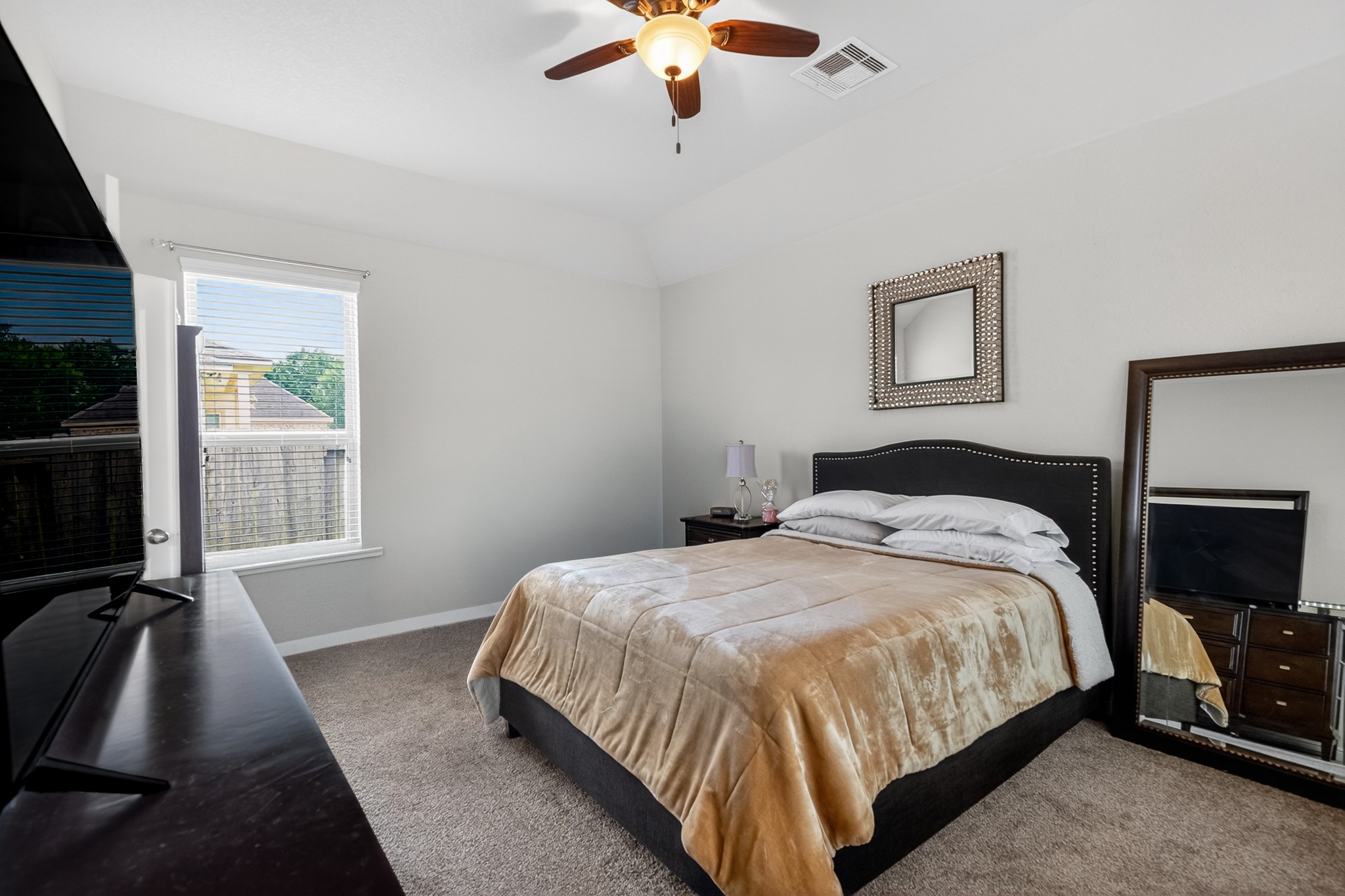 24711 East Burnaby Circle Spring, TX 77373 - Photo 11 of 20 a bedroom with a bed and window