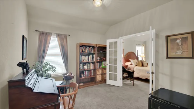 a room with furniture and a window