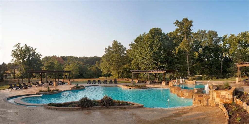 83 Bear Path Road Gordonville, TX 76245 - Photo 11 of 13 a view of a swimming pool with outdoor seating