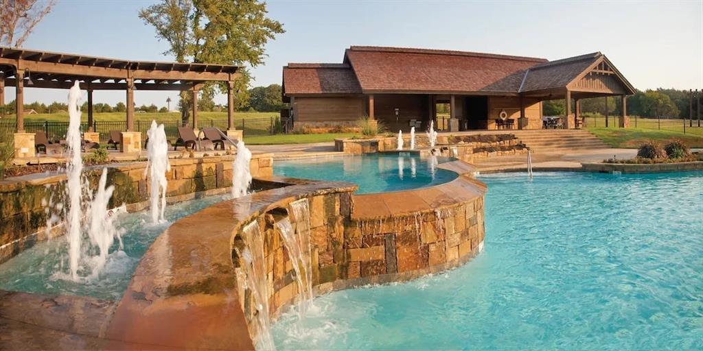 83 Bear Path Road Gordonville, TX 76245 - Photo 12 of 13 a view of swimming pool with outdoor seating and a patio
