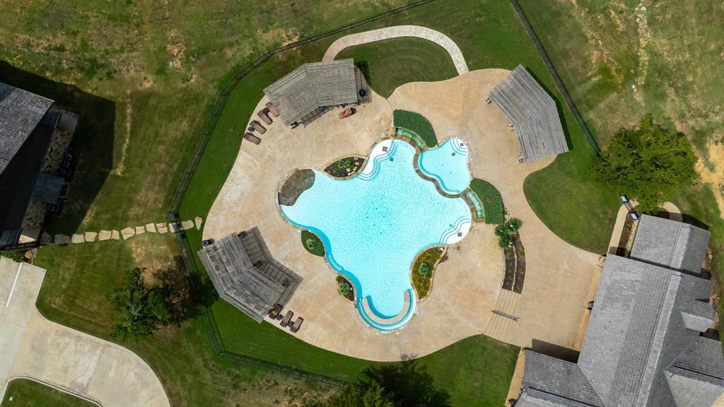 83 Bear Path Road Gordonville, TX 76245 - Photo 10 of 13 an aerial view of a house with a swimming pool