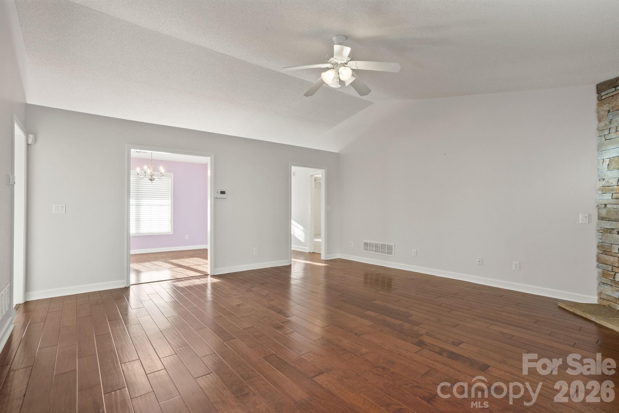 32 Stone House Road Hendersonville, NC 28739 - Photo 14 of 31 a view of an empty room with wooden floor