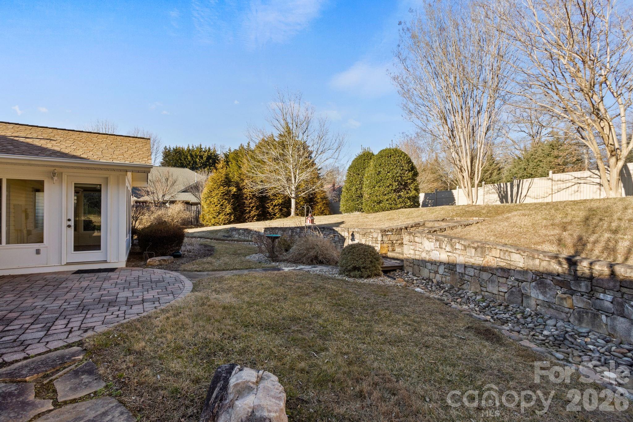 32 Stone House Road Hendersonville, NC 28739 - Photo 27 of 31 a view of a yard with a snow