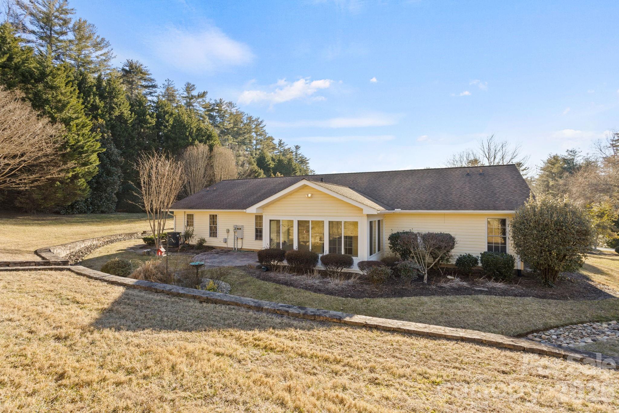 32 Stone House Road Hendersonville, NC 28739 - Photo 28 of 31 a front view of a house with a yard