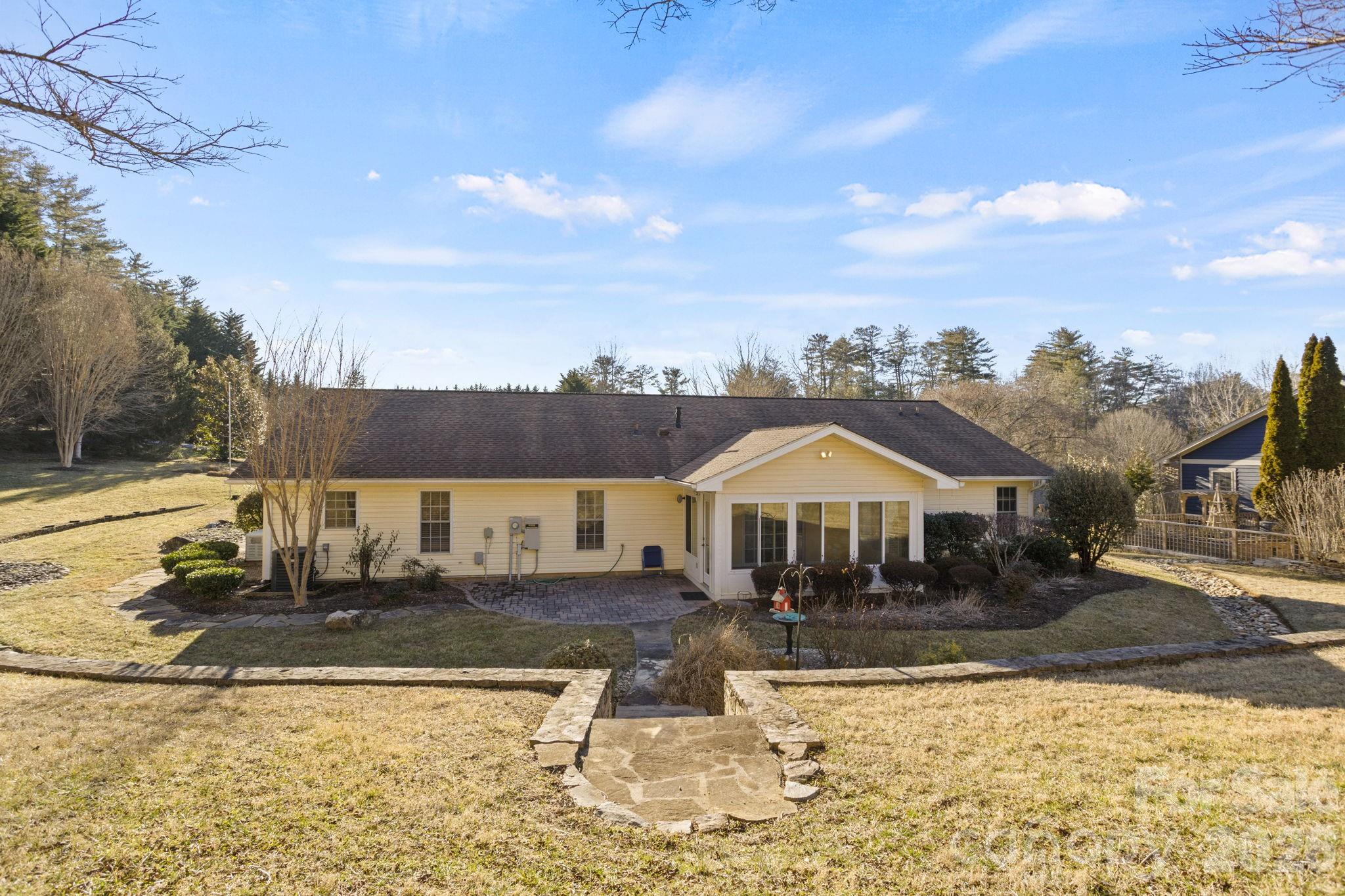 32 Stone House Road Hendersonville, NC 28739 - Photo 29 of 31 a front view of a house with a yard