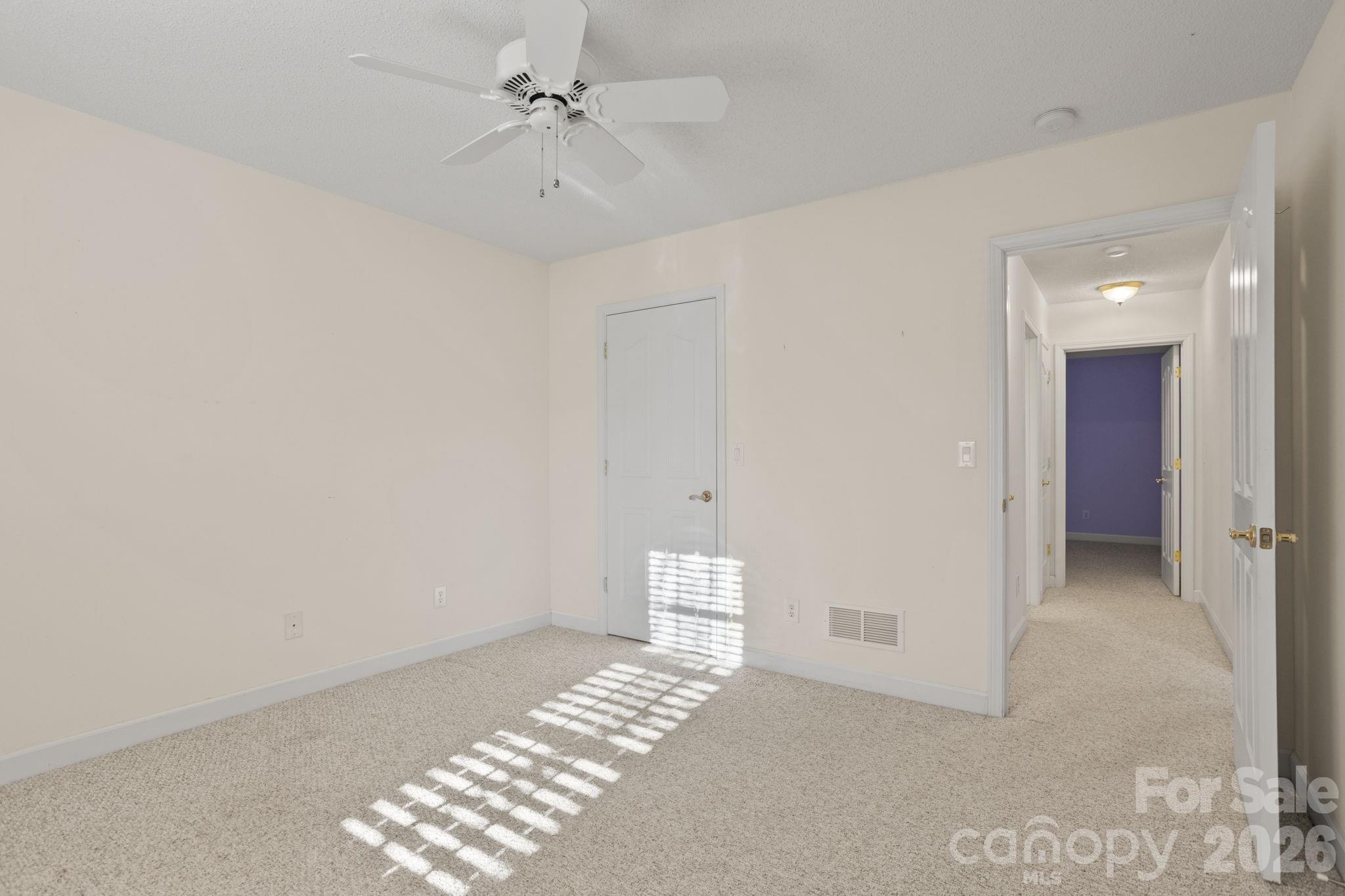 32 Stone House Road Hendersonville, NC 28739 - Photo 7 of 31 a view of an empty room with a window