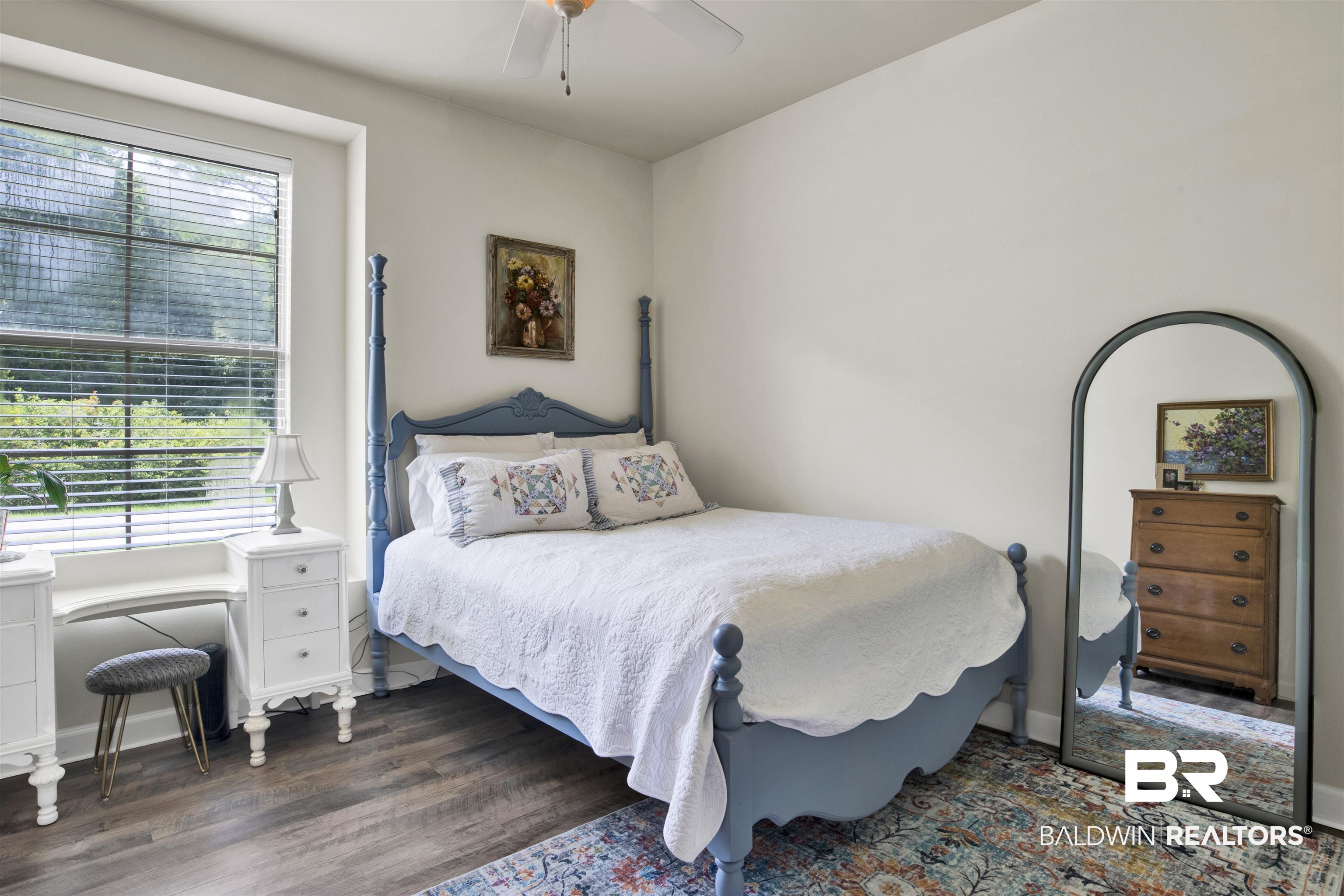 10368 Gayfer Rd Extension Fairhope, AL 36532 - Photo 26 of 43 Bright room featuring a large window with horizontal blinds