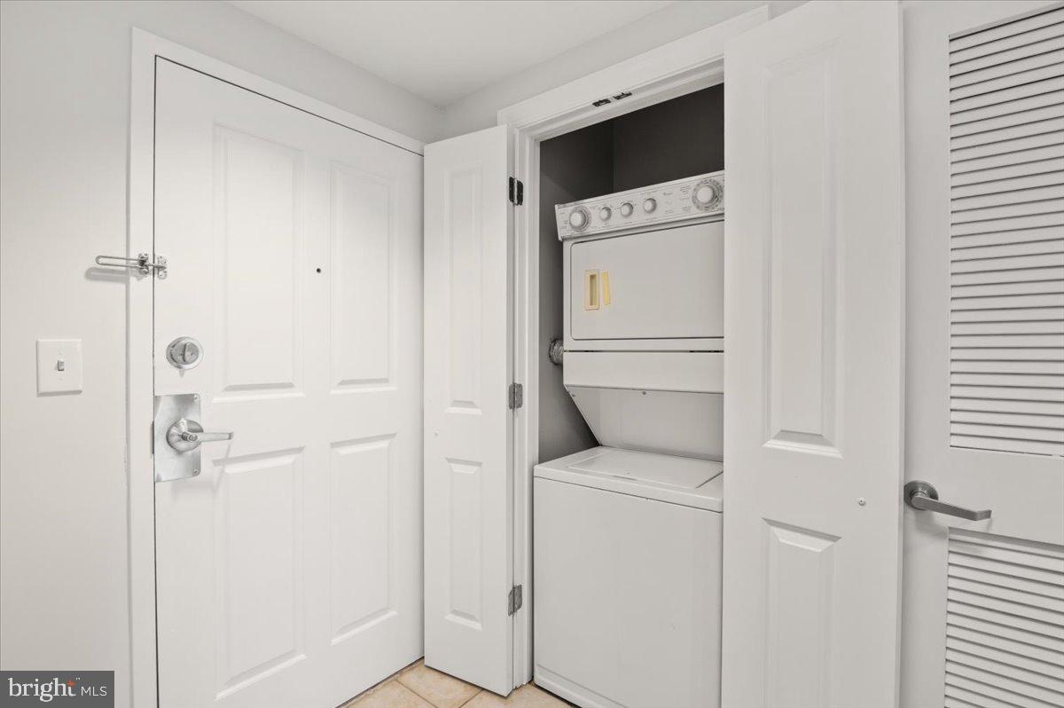 777 7th Street Northwest, Unit 630 Washington, DC 20001 - Photo 12 of 85 Washer and Dryer Located in Closet off Kitchen