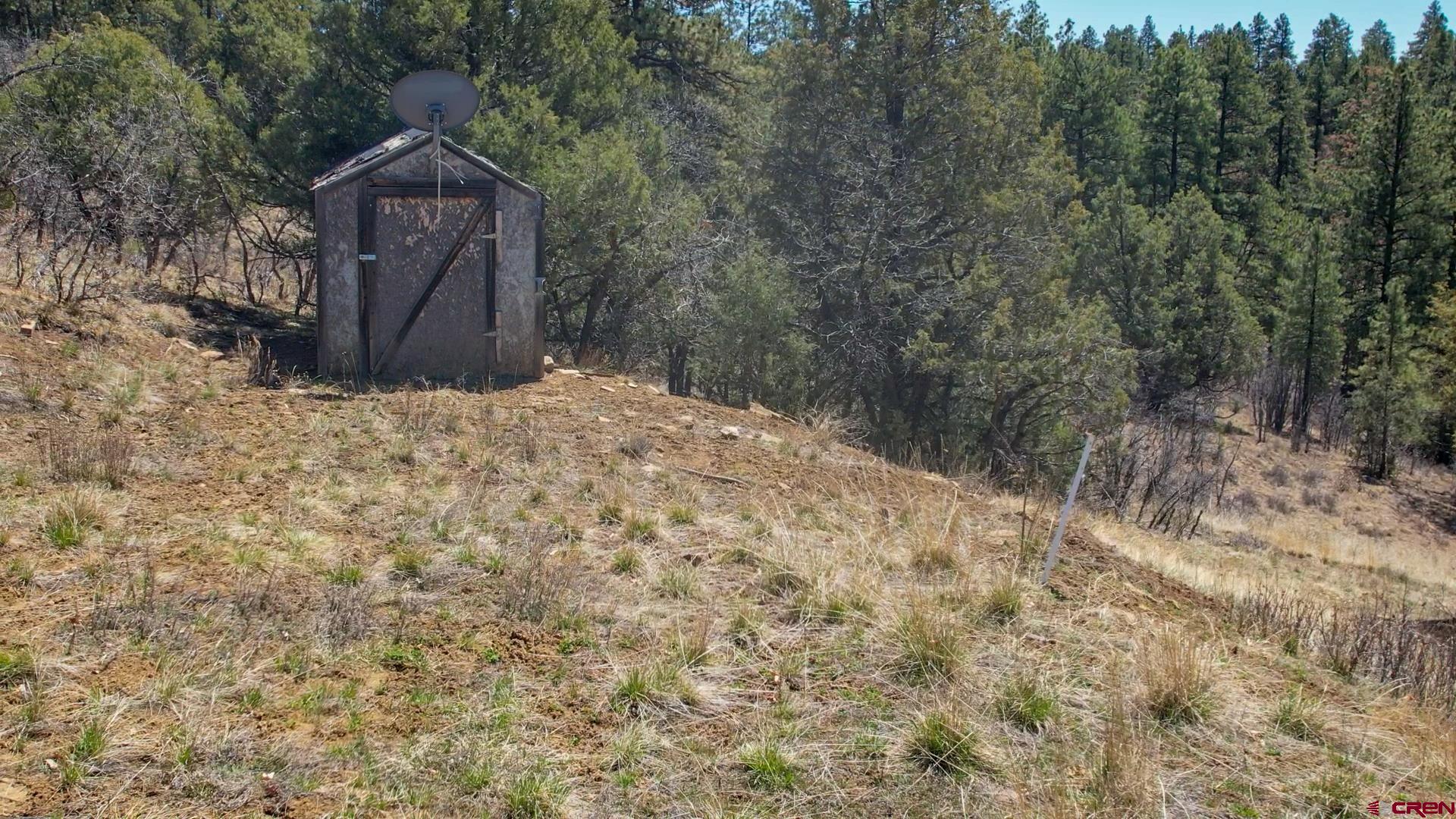 149-154 Engineer Point Pagosa Springs, CO 81147 - Photo 11 of 21 a view of wooden fence and trees