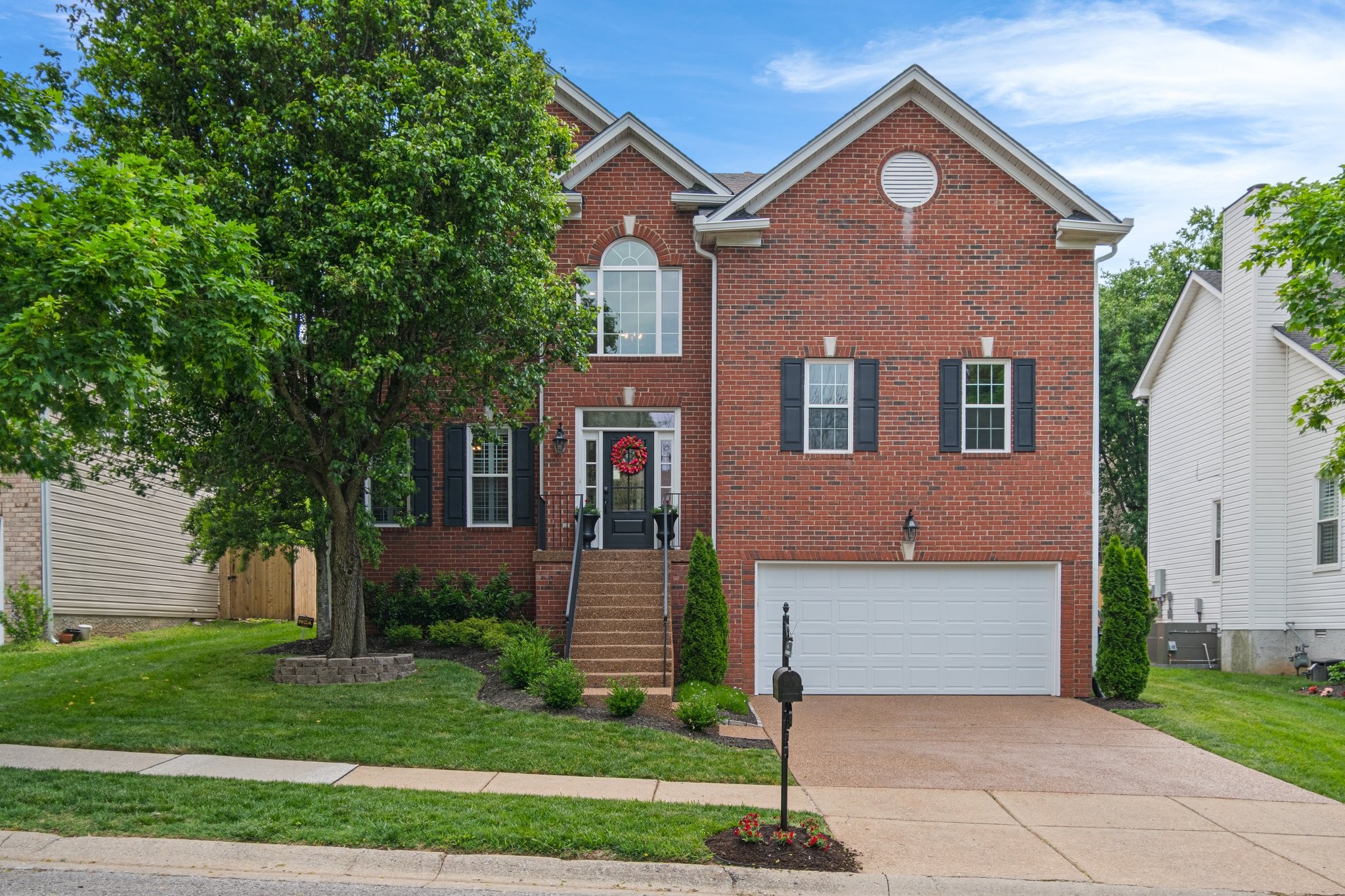 230 Bateman Avenue Franklin, TN 37067 - Photo 1 of 64 a front view of a house with a yard