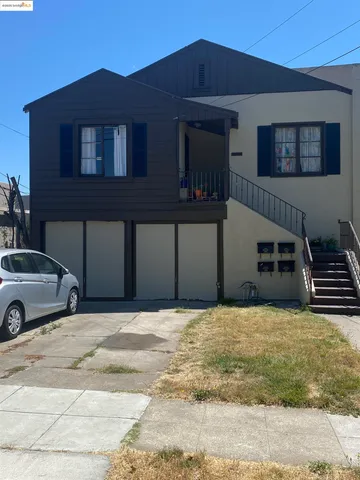 a car parked in front of a house