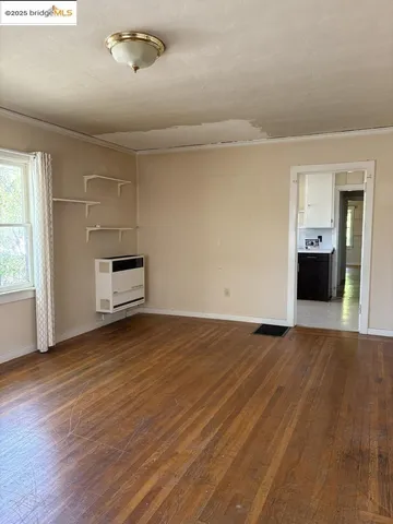 a kitchen with a sink and a window