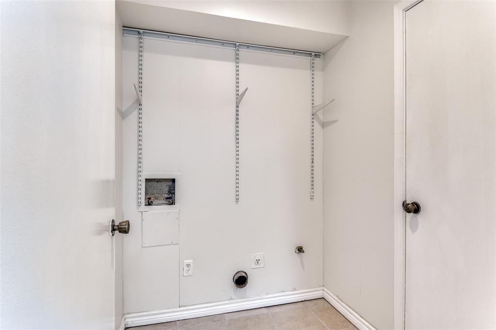2805 Raintree Drive Plano, TX 75074 - Photo 11 of 12 a bathroom with a glass shower door