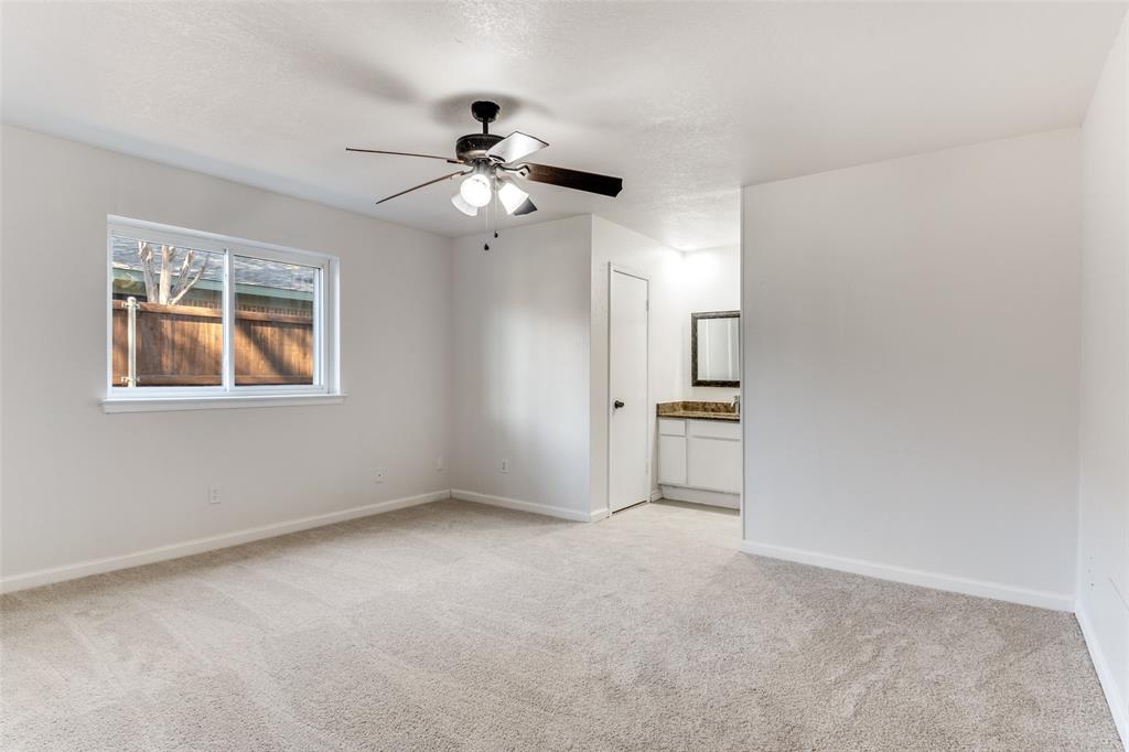 2805 Raintree Drive Plano, TX 75074 - Photo 9 of 12 a view of an empty room with a window