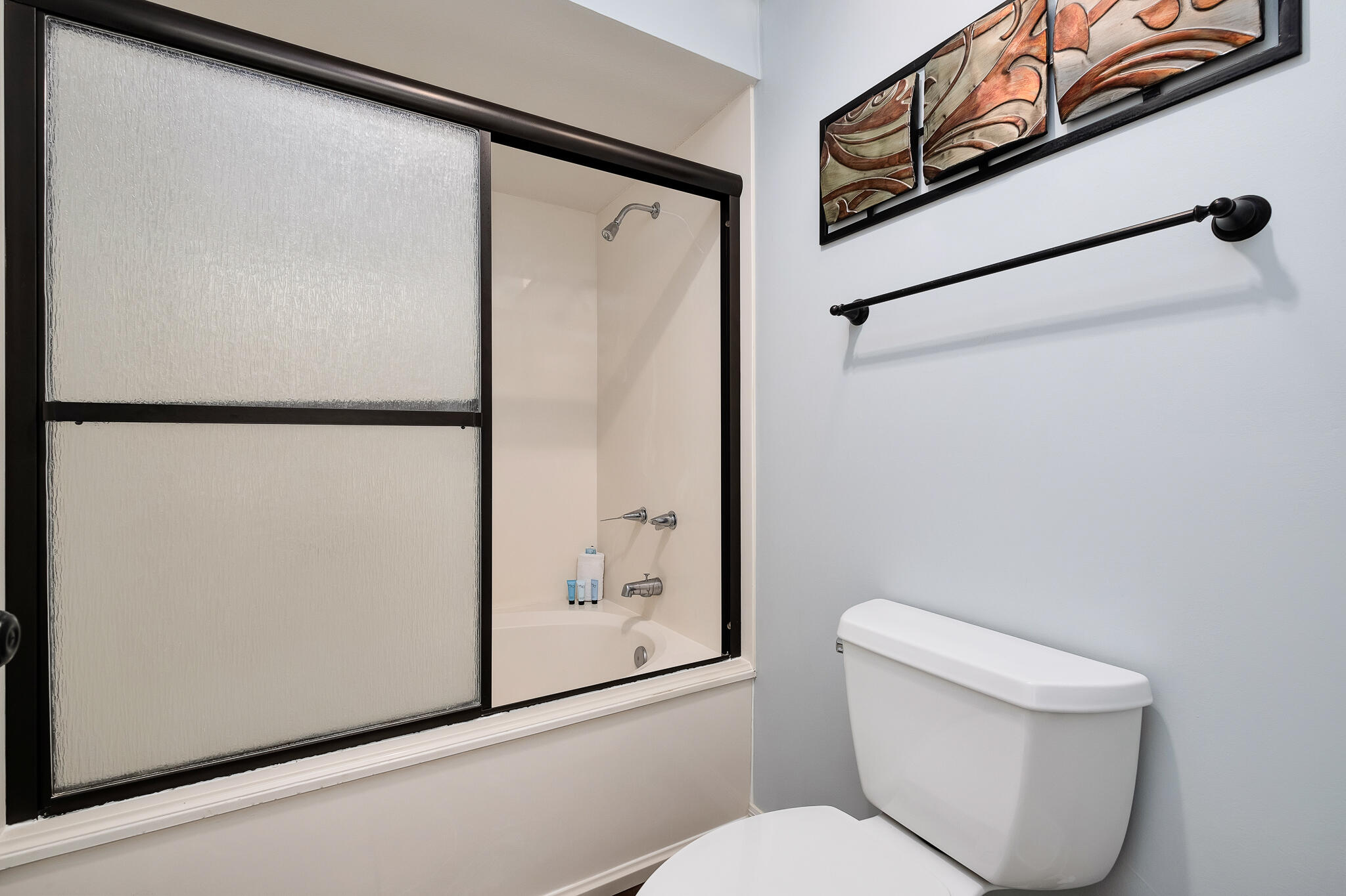 10254 East County Highway, Unit 312 Inlet Beach, FL 32461 - Photo 22 of 36 a white toilet sitting next to a bathroom sink
