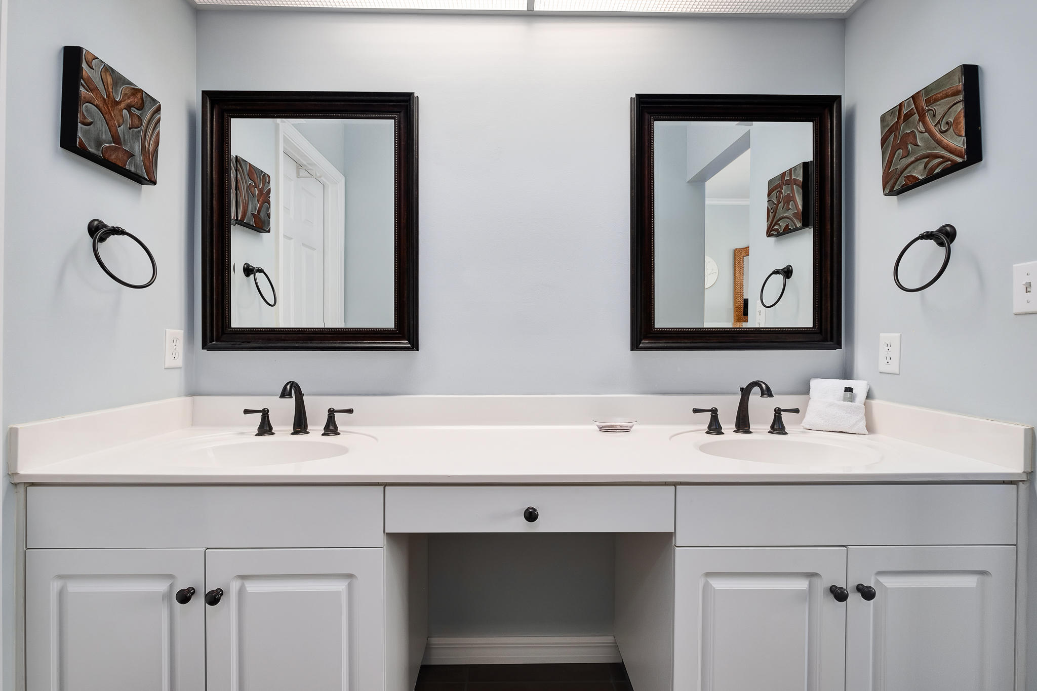 10254 East County Highway, Unit 312 Inlet Beach, FL 32461 - Photo 23 of 36 a bathroom with a sink and a mirror