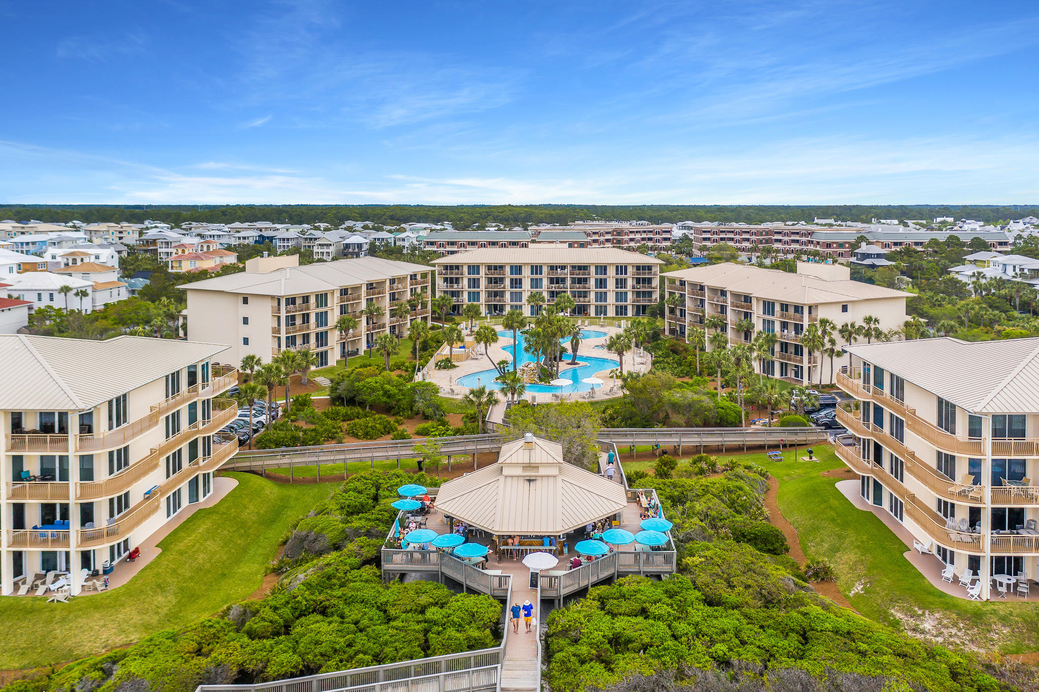 10254 East County Highway, Unit 312 Inlet Beach, FL 32461 - Photo 27 of 36 an aerial view of a city with lawn chairs