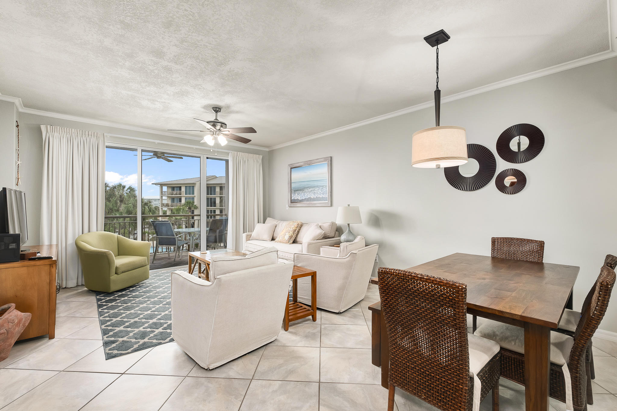 10254 East County Highway, Unit 312 Inlet Beach, FL 32461 - Photo 3 of 36 a living room with couches and kitchen view with wooden floor