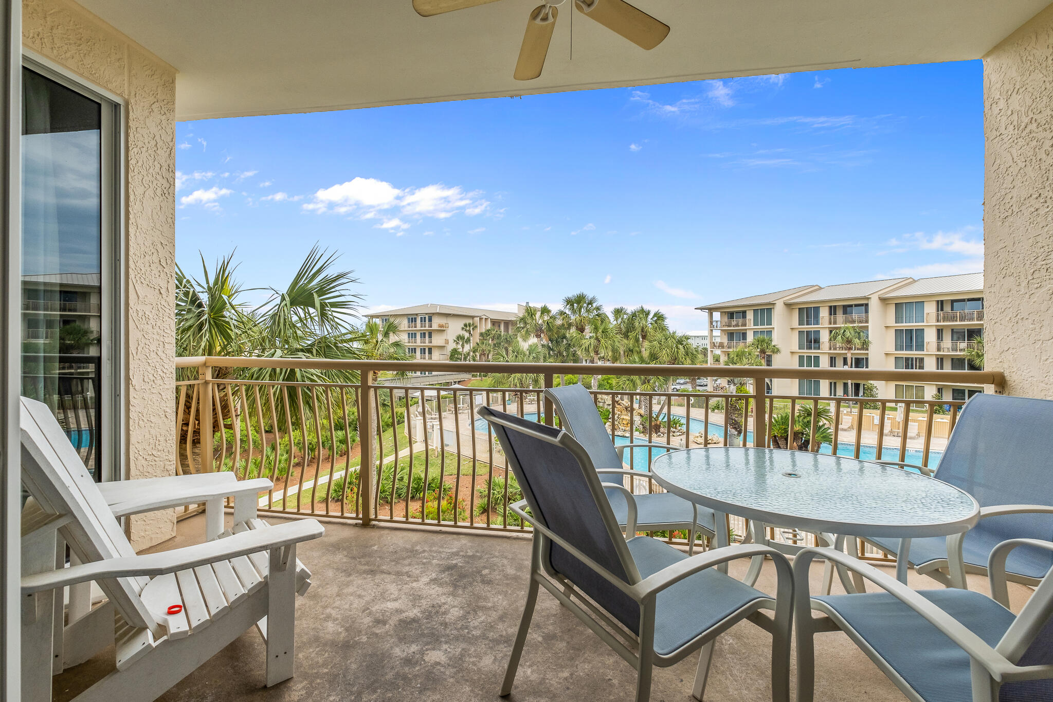 10254 East County Highway, Unit 312 Inlet Beach, FL 32461 - Photo 8 of 36 a view of a balcony with lake view and a potted plant