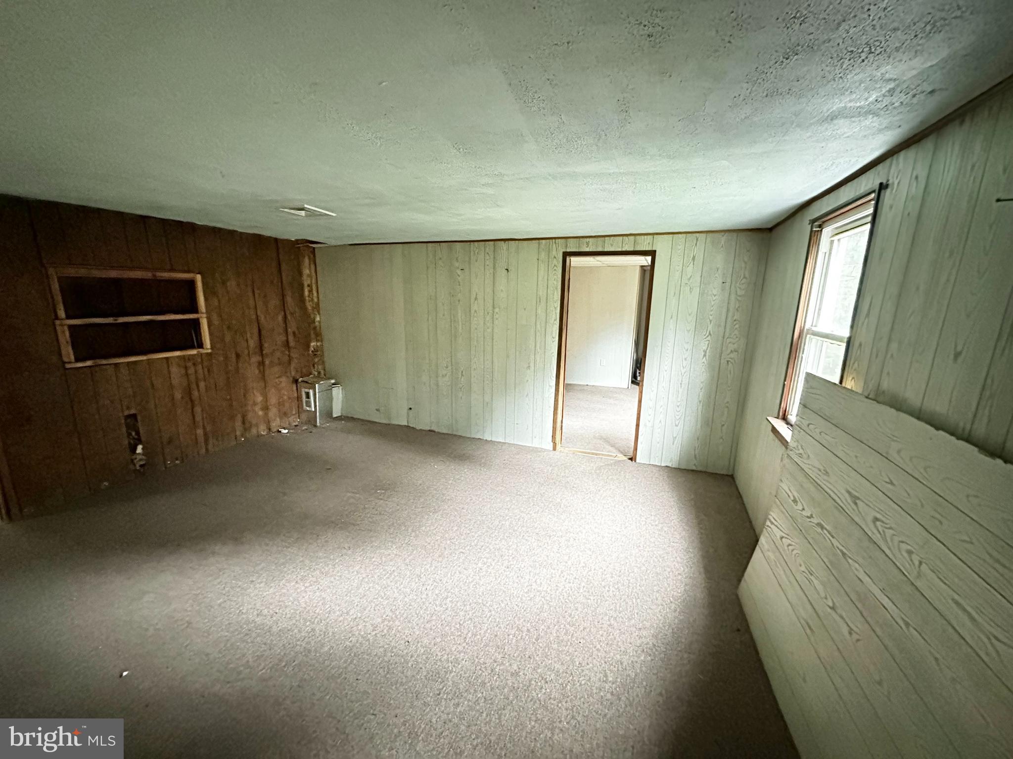 180 Buck Mountain Road Barnesville, PA 18214 - Photo 17 of 29 an empty room with windows