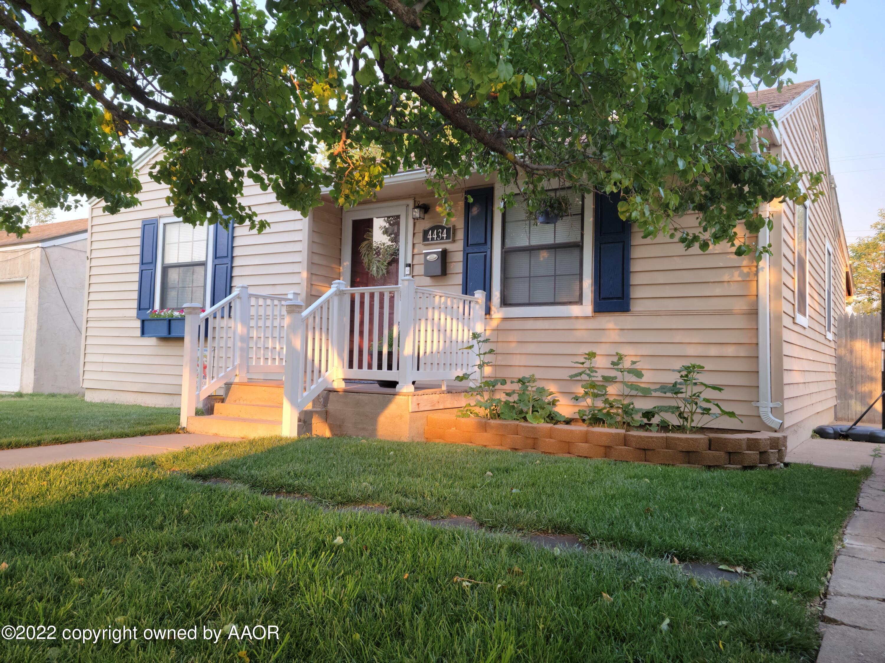 4434 South Travis Street Amarillo, TX 79110 - Photo 1 of 14 a front view of house with yard