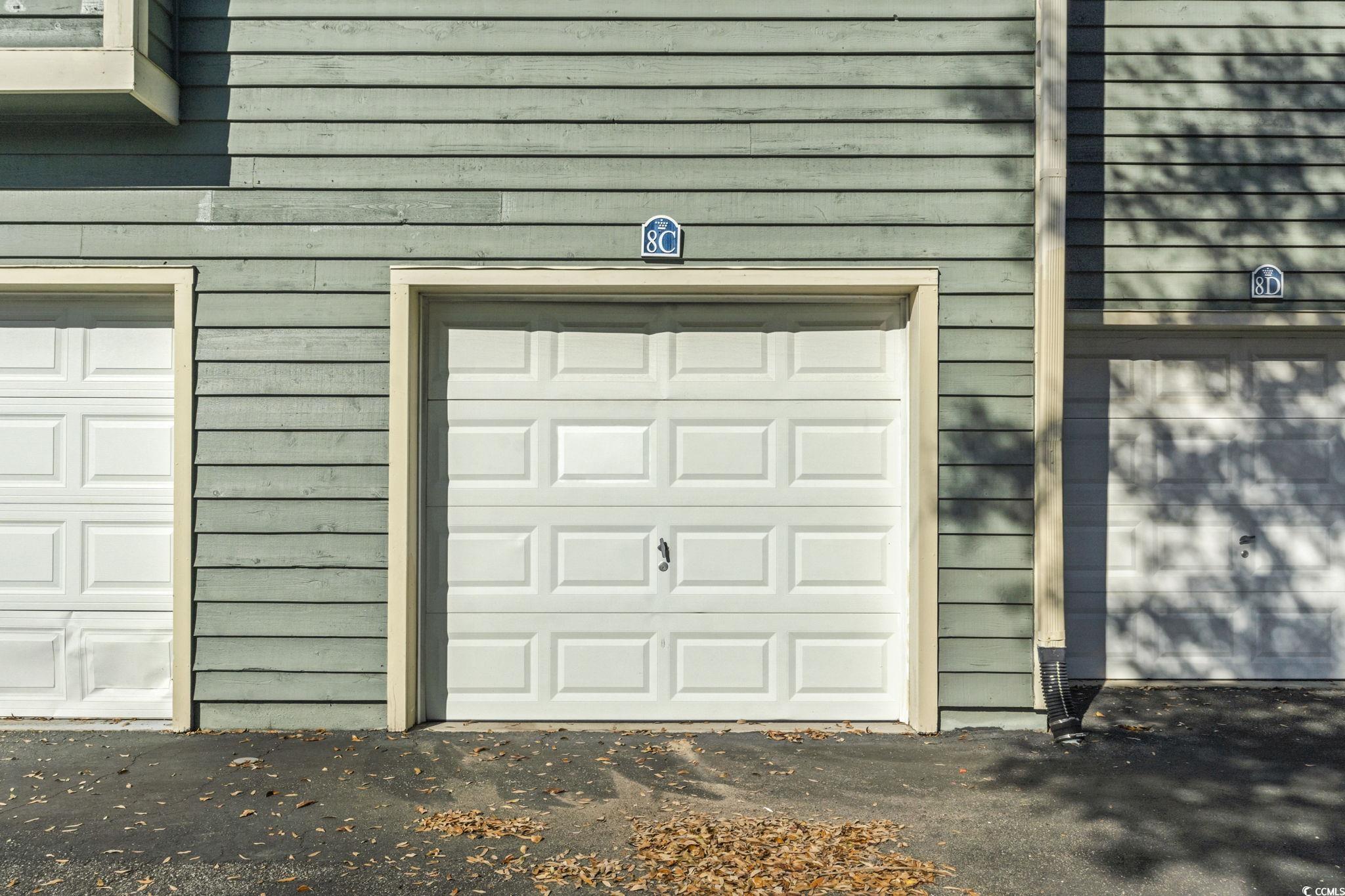 104 High Circle, Unit 8C Myrtle Beach, SC 29572 - Photo 5 of 36 View of garage