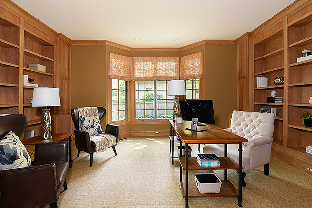 102 Church Road Winnetka, IL 60093 - Photo 12 of 42 a living room with furniture and a flat screen tv