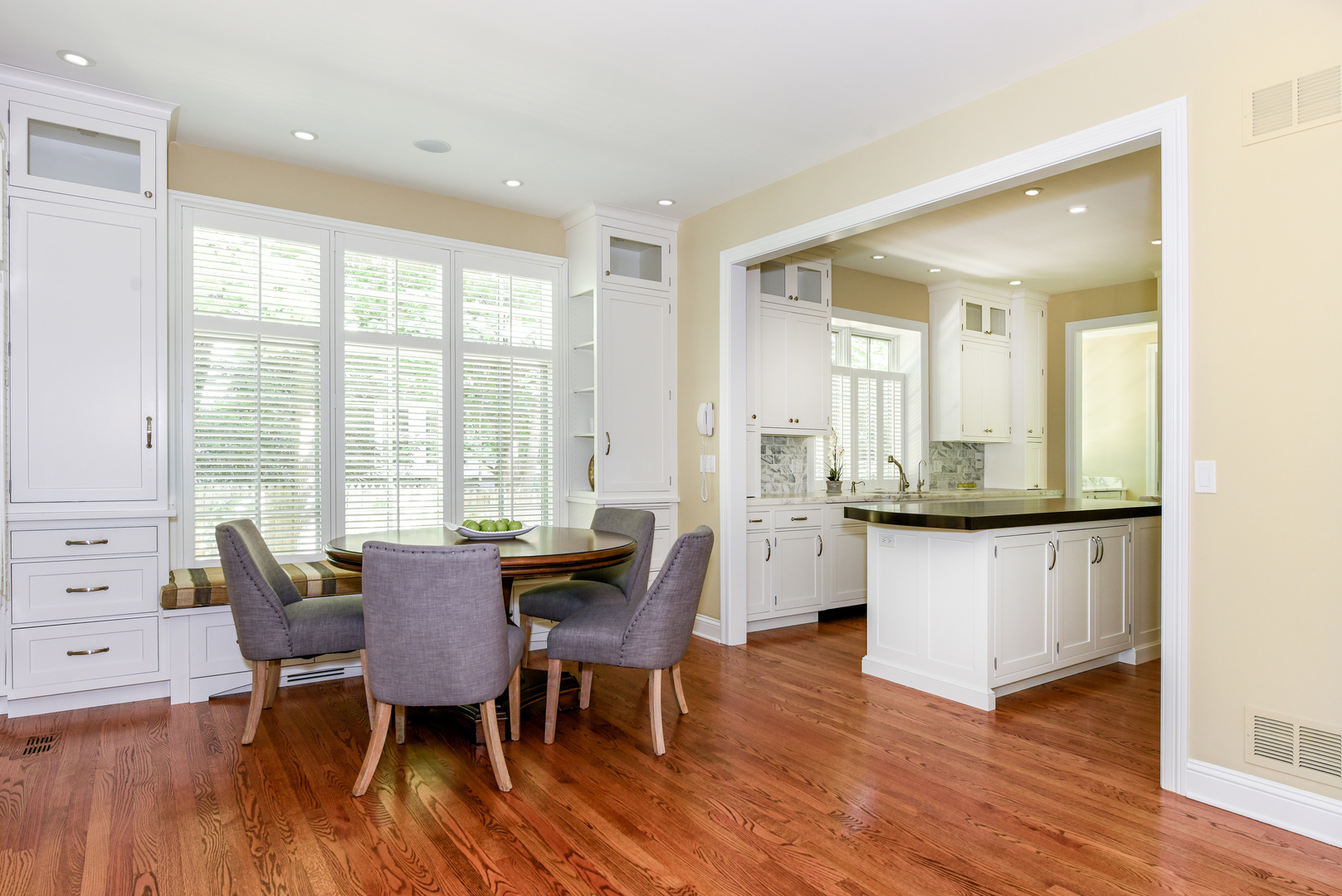 102 Church Road Winnetka, IL 60093 - Photo 16 of 42 a view of a dining room with furniture and wooden floor