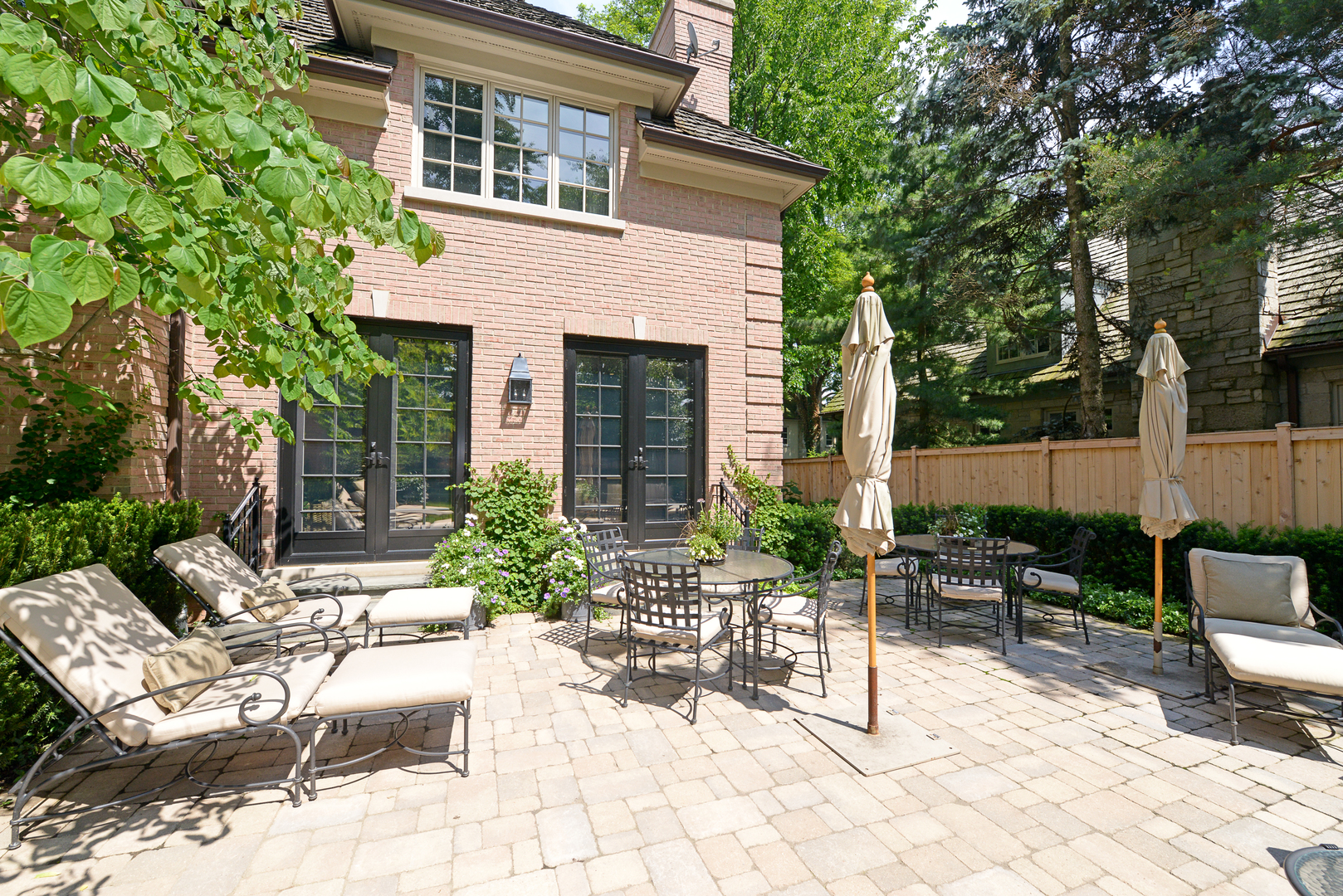 102 Church Road Winnetka, IL 60093 - Photo 41 of 42 a view of backyard with outdoor seating and plants