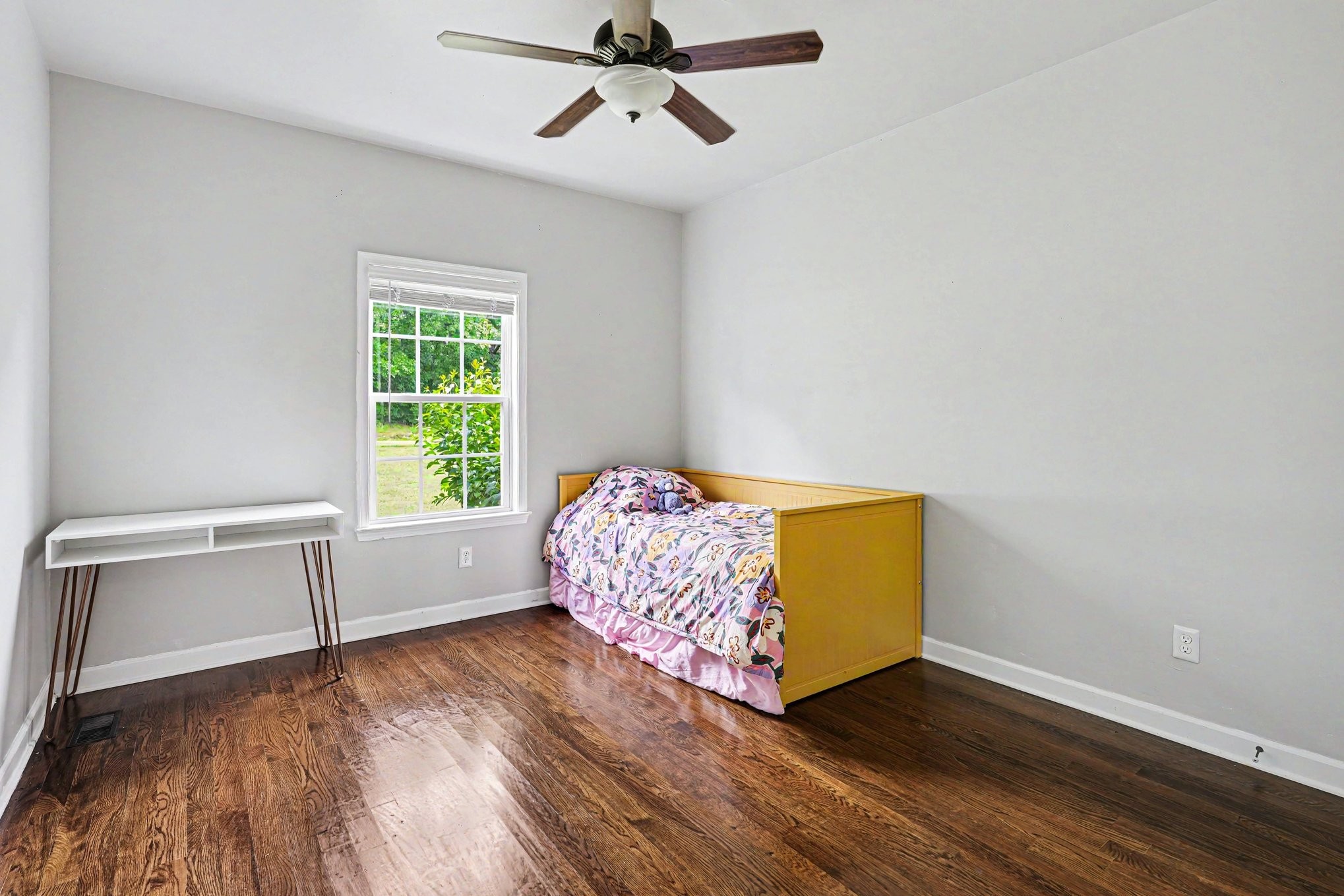 948 Goslin Branch Road Burns, TN 37029 - Photo 17 of 37 wooden floor in an empty room with a window