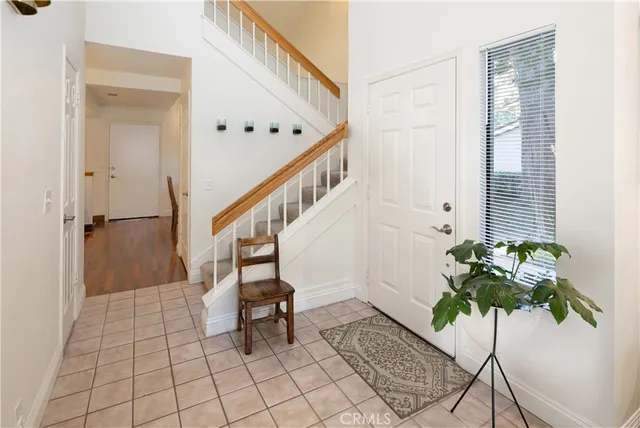 a view of entryway with wooden floor