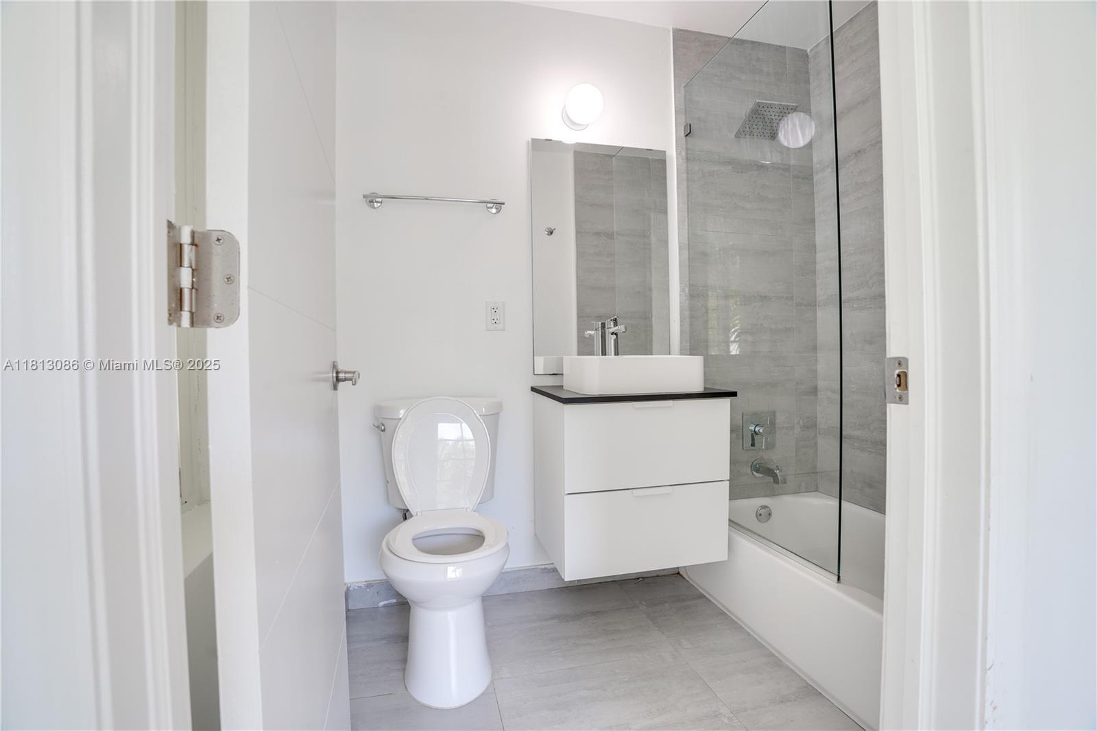 1201 South Biscayne Point Road Miami Beach, FL 33141 - Photo 12 of 35 a bathroom with a toilet and a shower